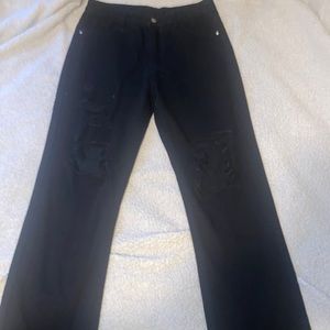 Black ripped flare jeans